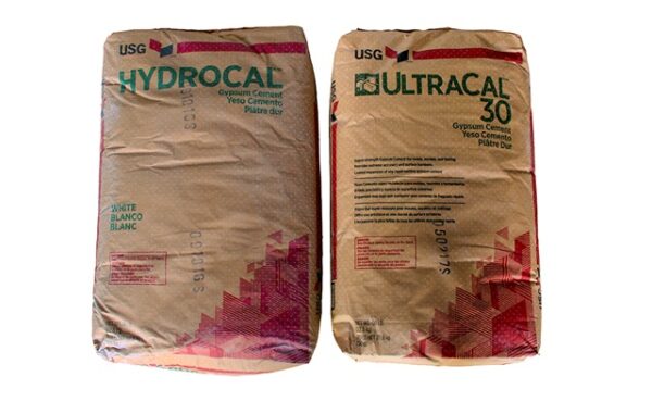 Two bags of gypsum cement products