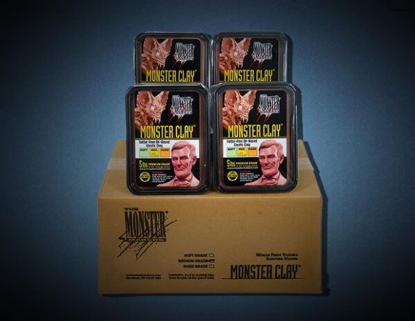 Four packs of Monster Clay displayed.