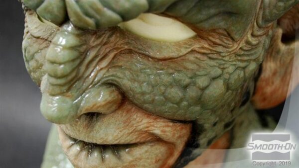 Detailed green goblin mask close-up