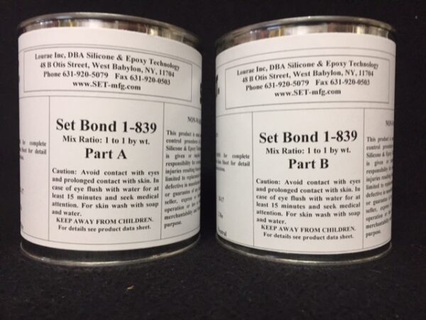 Two cans of epoxy adhesive components